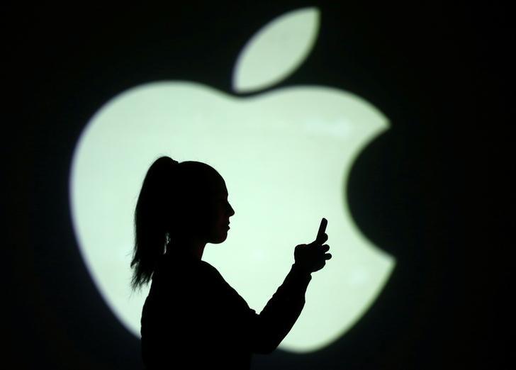 Apple surprises with solid iPhone sales, announces $100 billion…